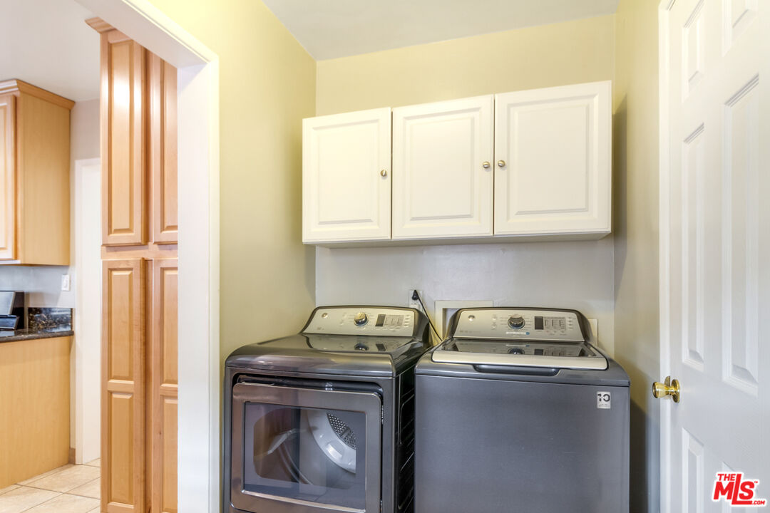 4253 Rudisill Street Montclair, CA 91763 - Photo 15 of 31 a utility room with closet dryer and washer