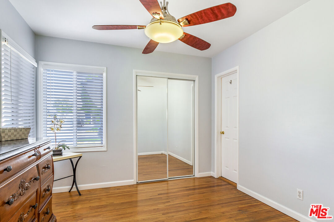 4253 Rudisill Street Montclair, CA 91763 - Photo 20 of 31 a view of an empty room with window and wooden floor