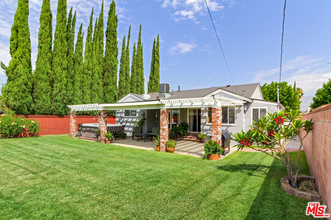 4253 Rudisill Street Montclair, CA 91763 - Photo 24 of 31 a view of a house with a yard patio and sitting area