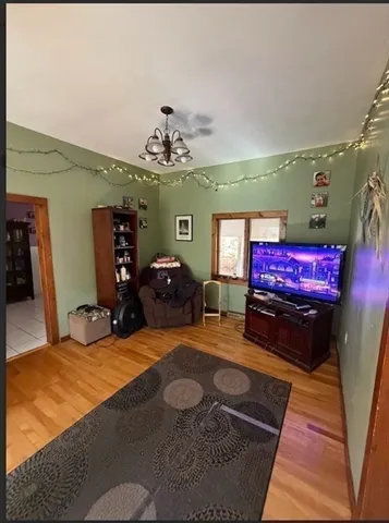 a view of a livingroom with furniture and a couch