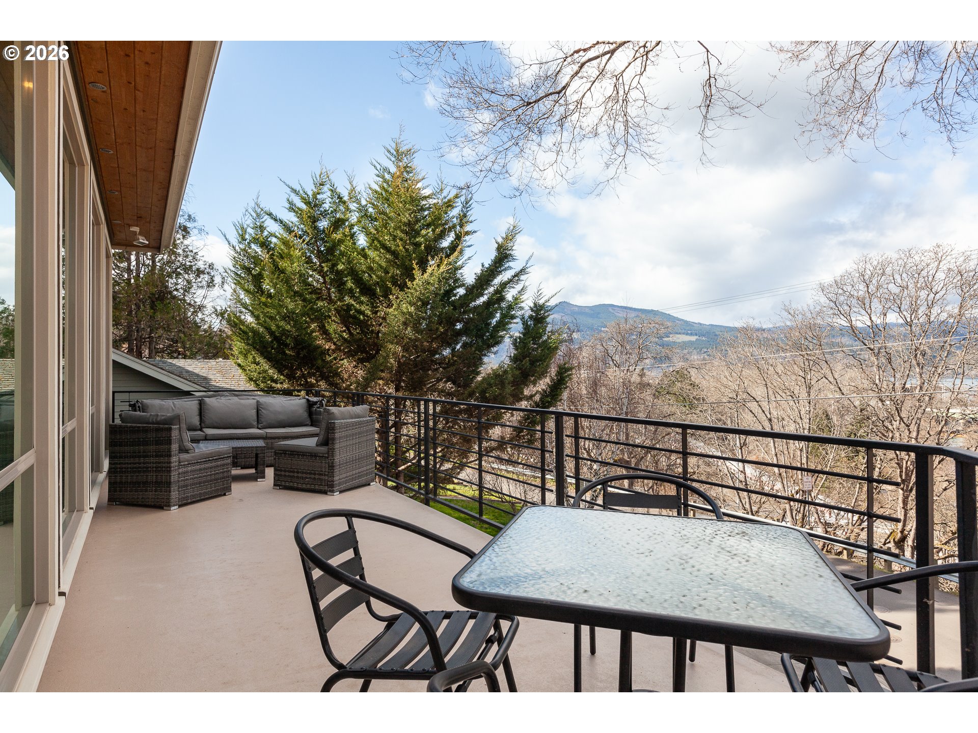 402 Bluff Road Hood River, OR 97031 - Photo 12 of 39 a terrace of a house with outdoor seating