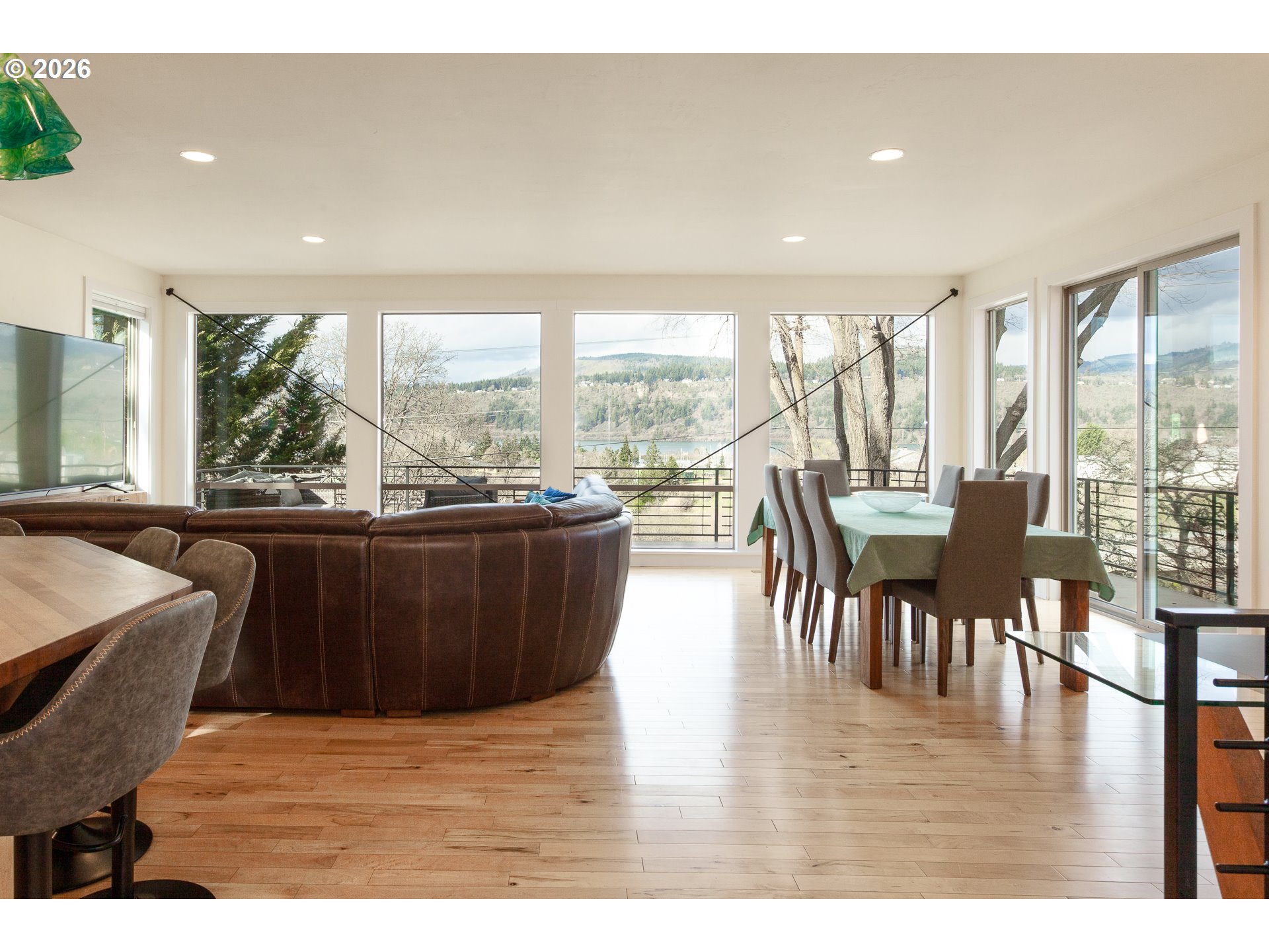 402 Bluff Road Hood River, OR 97031 - Photo 9 of 39 a dining room with furniture window and wooden floor