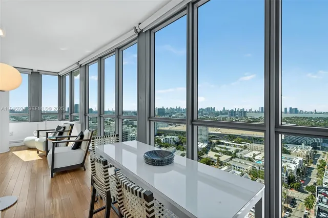 a bedroom with a bed and a night stand