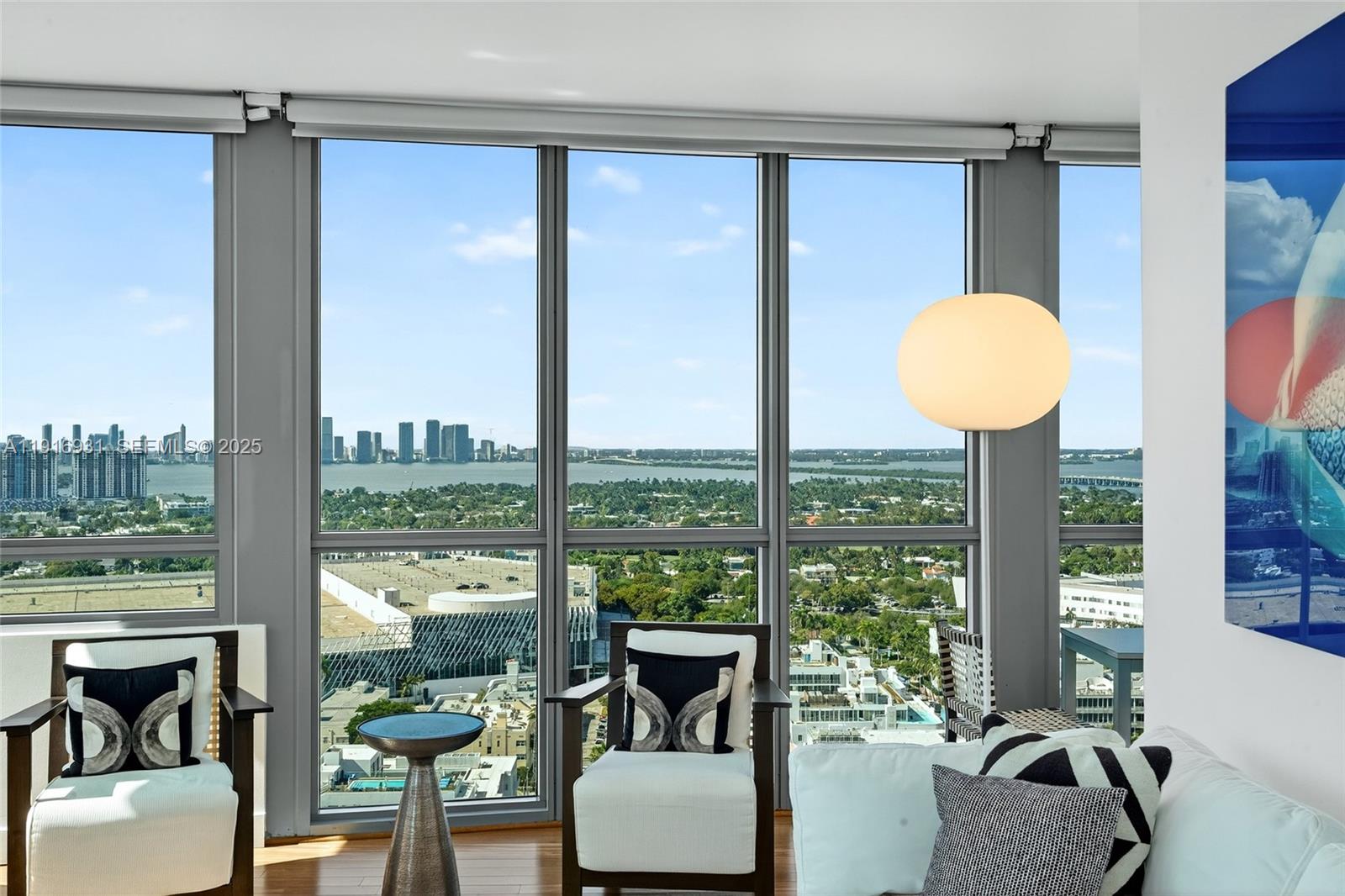 101 20th Street, Unit 2902 Miami Beach, FL 33139 - Photo 4 of 16 a room with furniture and a window