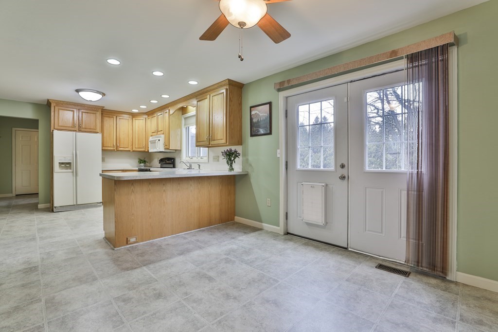 40 Mallard Point Road Merrimack, NH 03054 - Photo 15 of 40 a view of a kitchen with a sink and cabinets