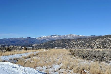 100 Prospect Peak Road Eagle, CO 81631 - Photo 3 of 7 a view of a lake with mountains in the background