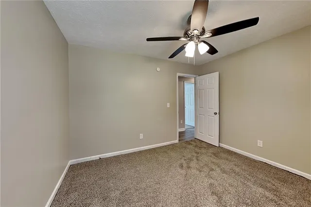 a view of an empty room and window