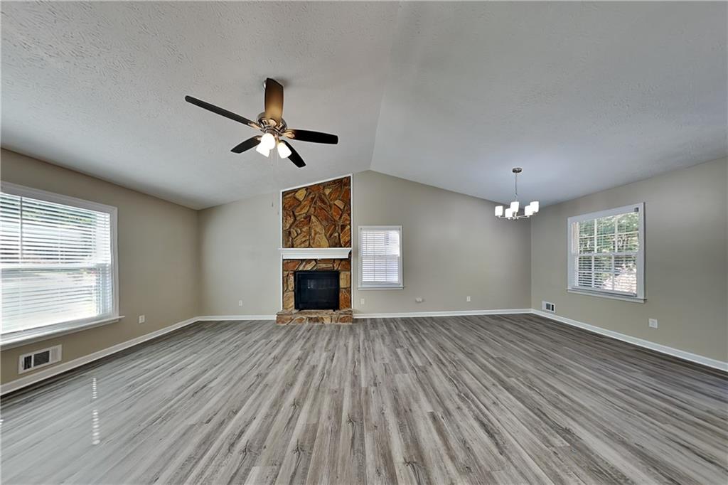 166 Kelly Court Dallas, GA 30157 - Photo 3 of 19 wooden floor in an empty room with a window