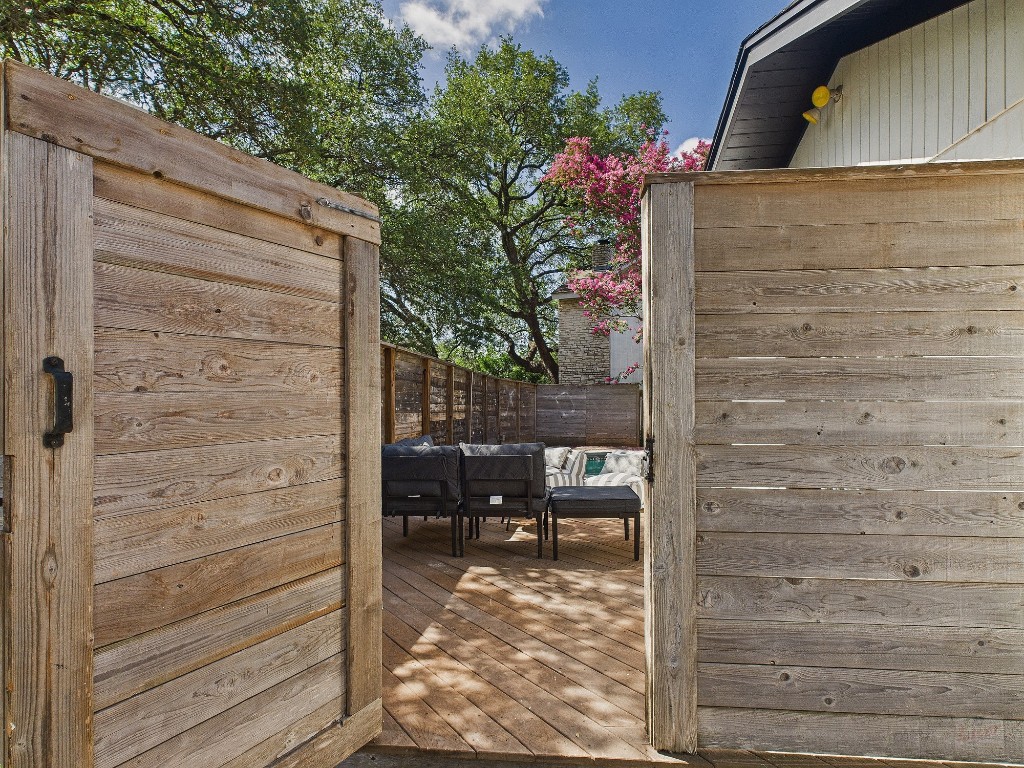 6108 Shadow Valley Drive, Unit A Austin, TX 78731 - Photo 7 of 31 a backyard of a house with outdoor seating