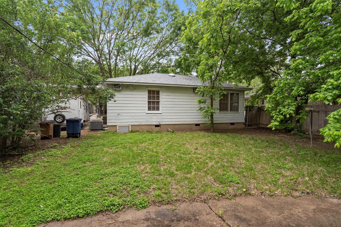 1511 Alguno Road Austin, TX 78757 - Photo 19 of 25 a front view of a house with a garden