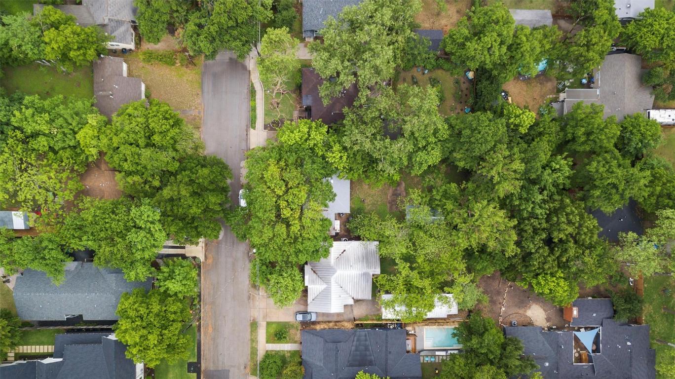 1511 Alguno Road Austin, TX 78757 - Photo 20 of 25 an aerial view of a house with outdoor space and lake view
