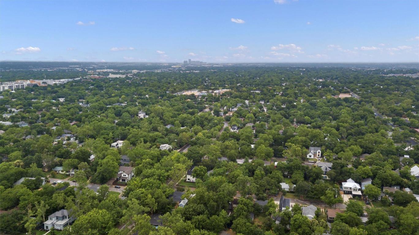 1511 Alguno Road Austin, TX 78757 - Photo 21 of 25 an aerial view of residential houses with city and outdoor space