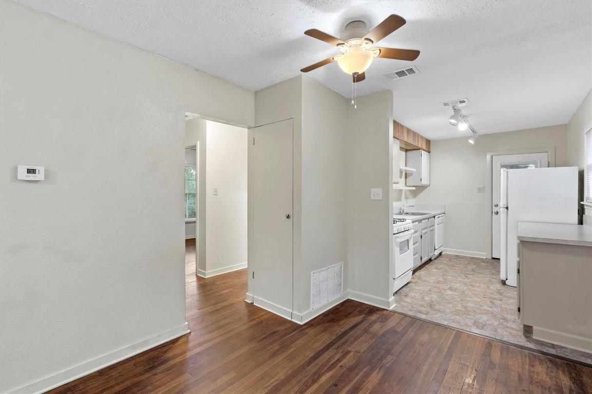 1511 Alguno Road Austin, TX 78757 - Photo 3 of 25 a view of empty room with wooden floor
