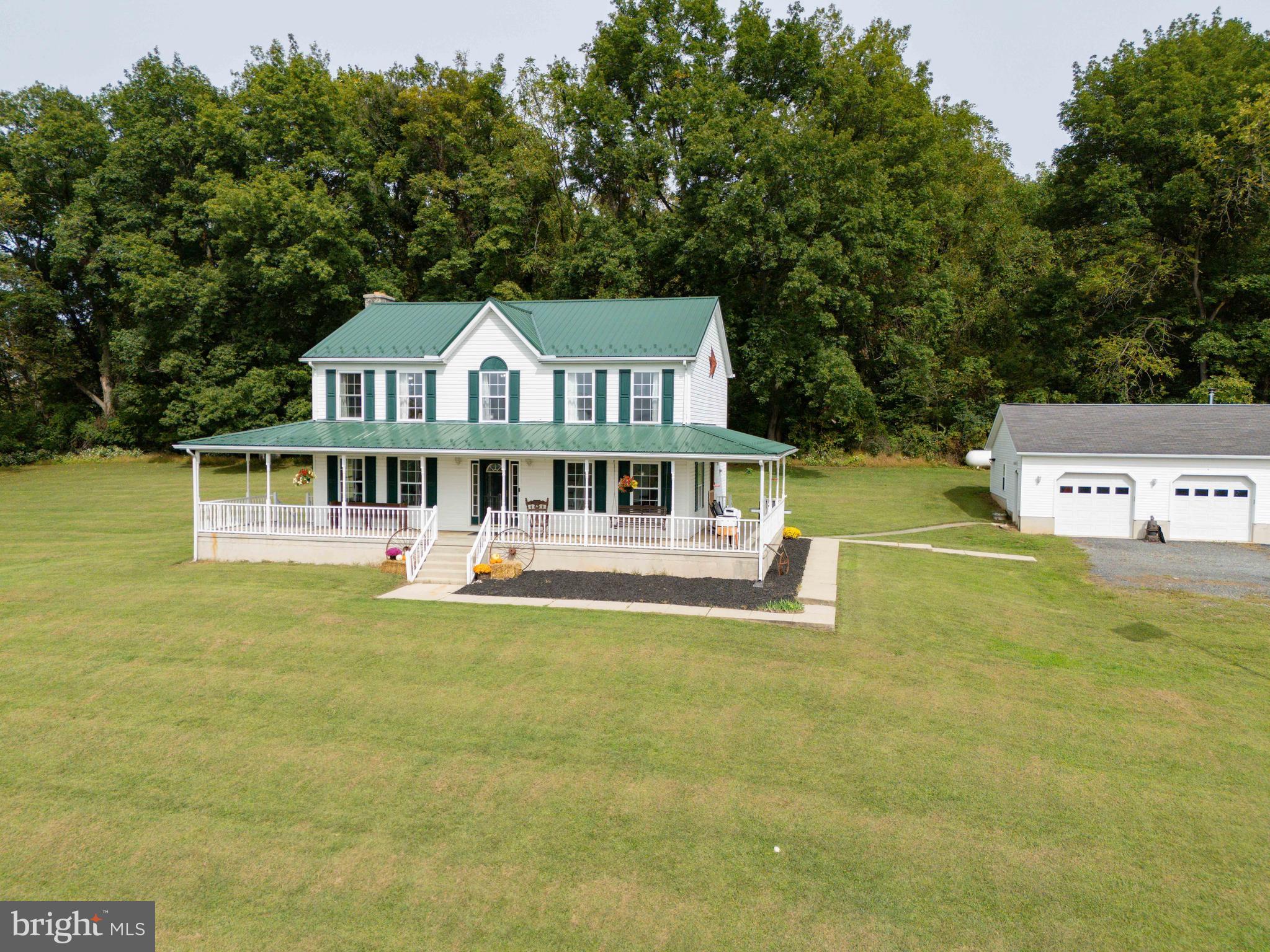 424 Springhill Road Rising Sun, MD 21911 - Photo 14 of 42 a front view of a house with a garden