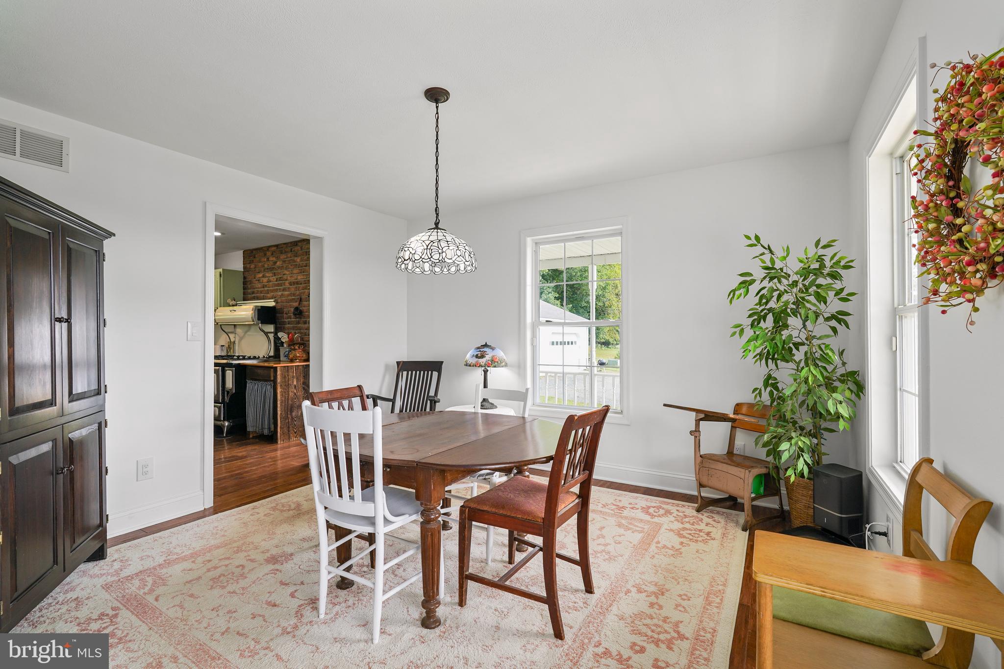 424 Springhill Road Rising Sun, MD 21911 - Photo 20 of 42 a view of a dining room with furniture window and wooden floor