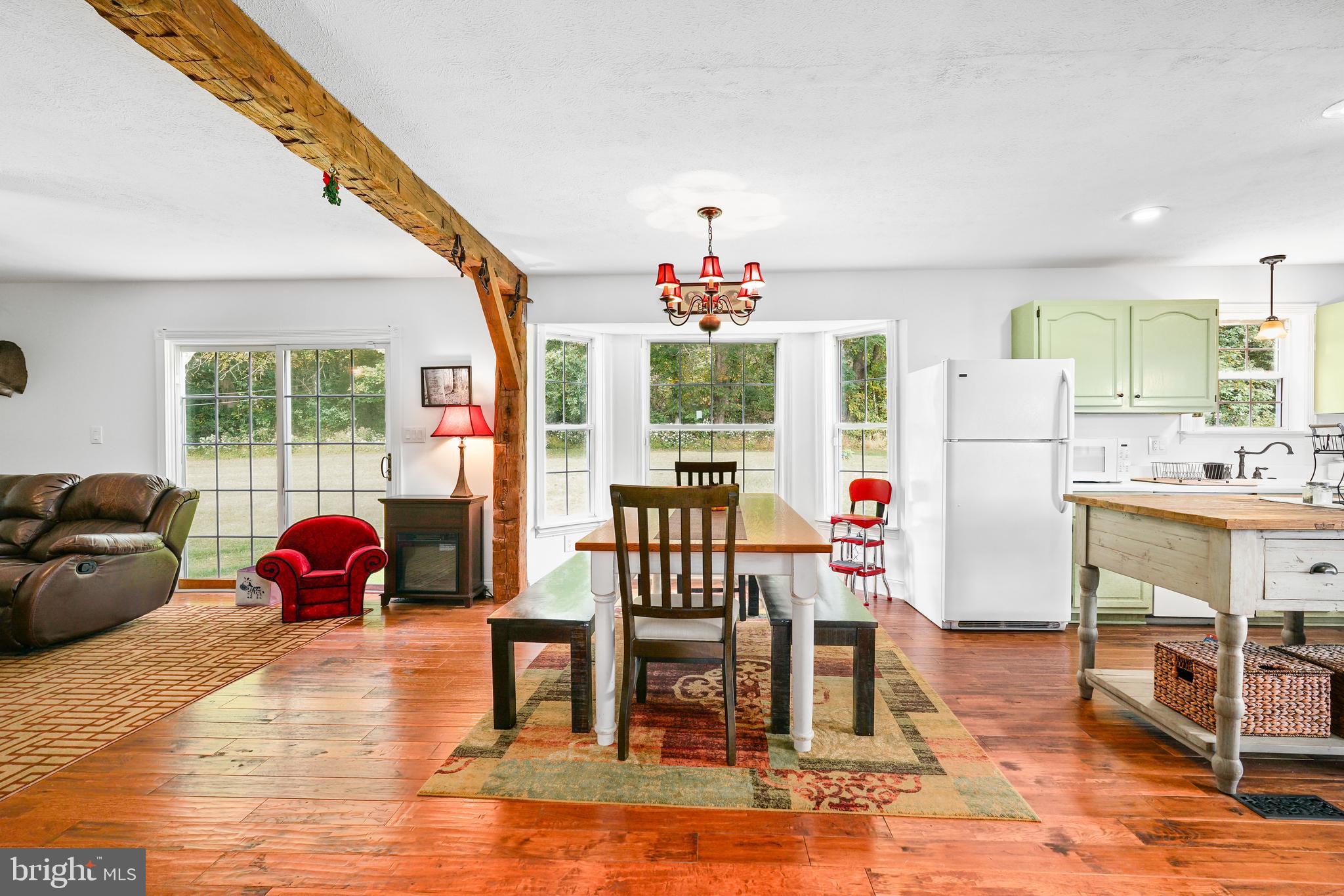 424 Springhill Road Rising Sun, MD 21911 - Photo 23 of 42 a living room with furniture and a floor to ceiling window