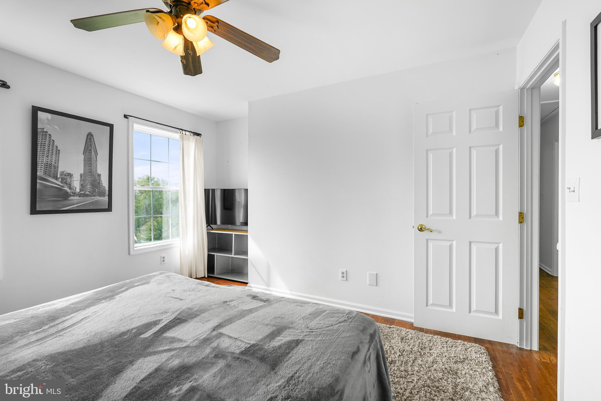424 Springhill Road Rising Sun, MD 21911 - Photo 31 of 42 a view of a bedroom with a window and a ceiling fan