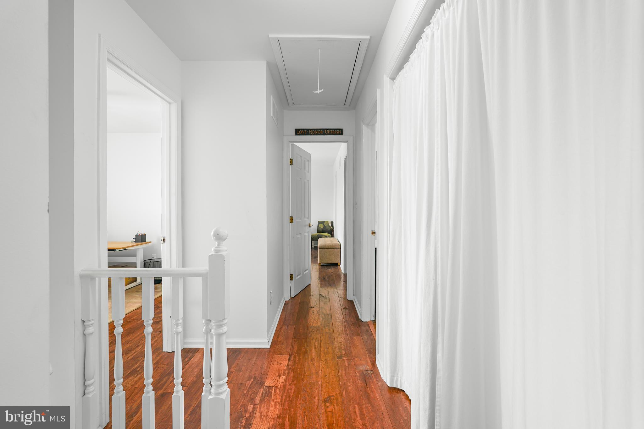 424 Springhill Road Rising Sun, MD 21911 - Photo 33 of 42 a view of a hallway with wooden floor and staircase