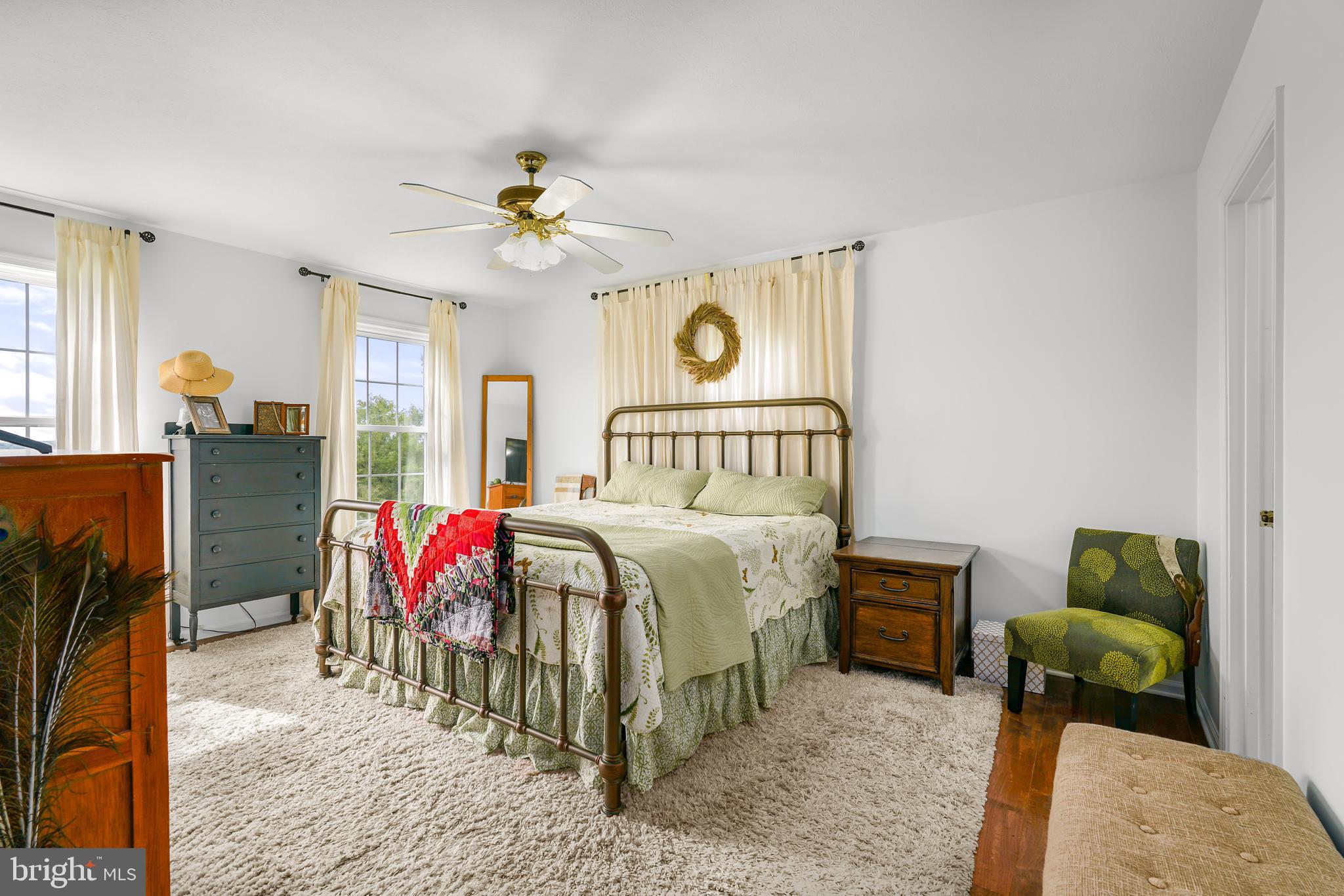 424 Springhill Road Rising Sun, MD 21911 - Photo 36 of 42 a bedroom with a bed and a chandelier