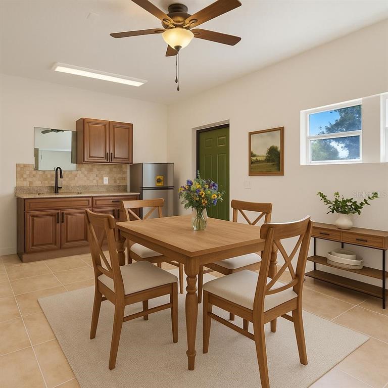 13832 South Bay Lake Road Groveland, FL 34736 - Photo 33 of 55 a view of a dining room with furniture