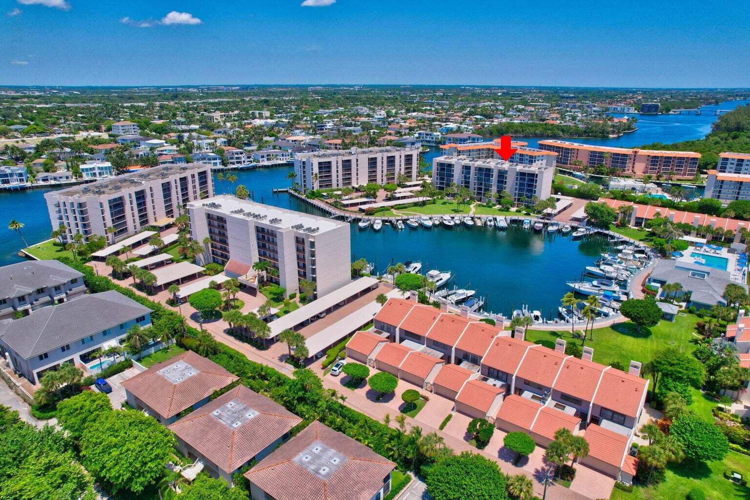 2707 North Ocean Boulevard, Unit D205 Boca Raton, FL 33431 - Photo 41 of 51 an aerial view of residential building and lake