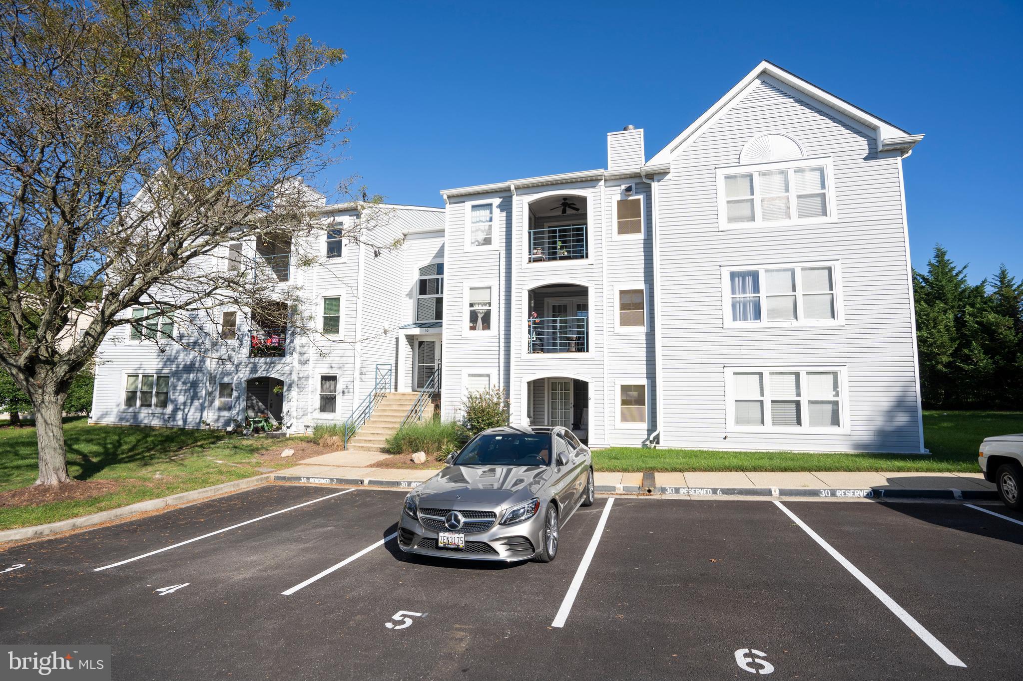 30 I Greystone Court, Unit I Annapolis, MD 21403 - Photo 1 of 15 a car parked in front of a building