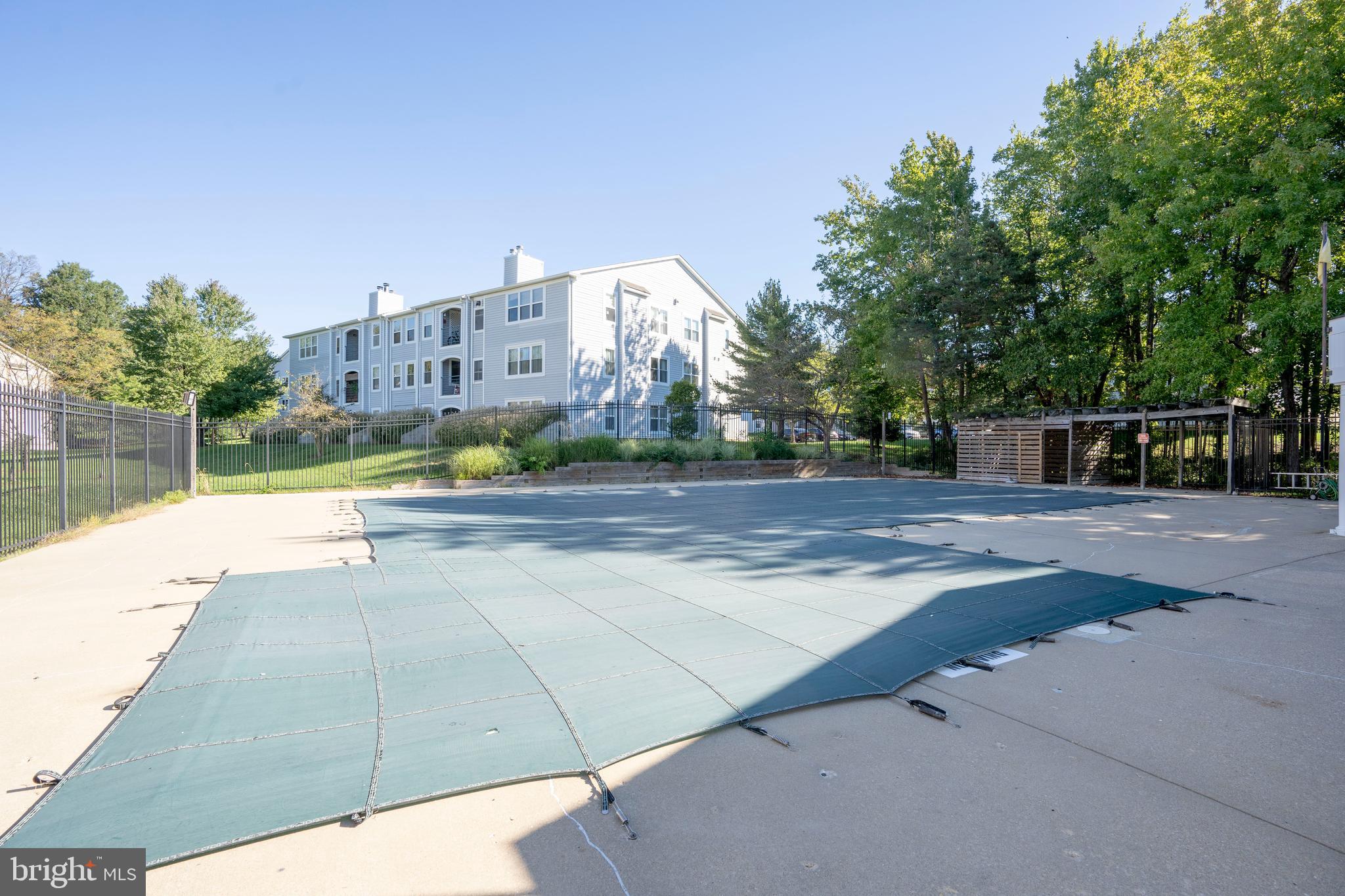30 I Greystone Court, Unit I Annapolis, MD 21403 - Photo 15 of 15 a view of city street with a building and trees in the background