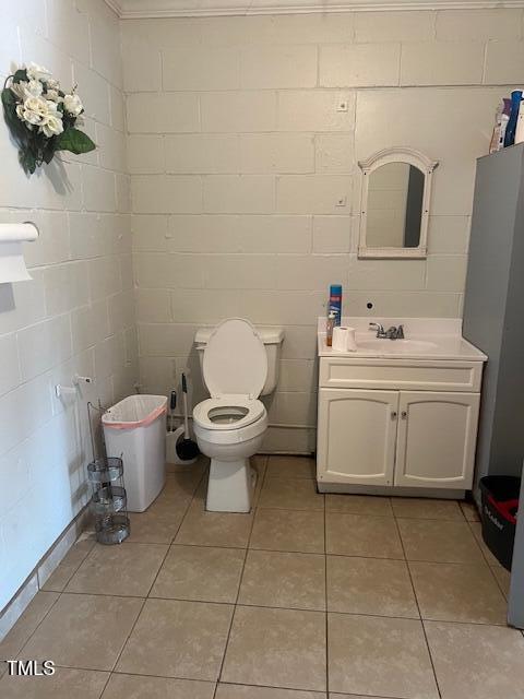 4400 Newton Grove Highway Newton Grove, NC 28366 - Photo 4 of 11 a white toilet sitting next to a bathroom sink