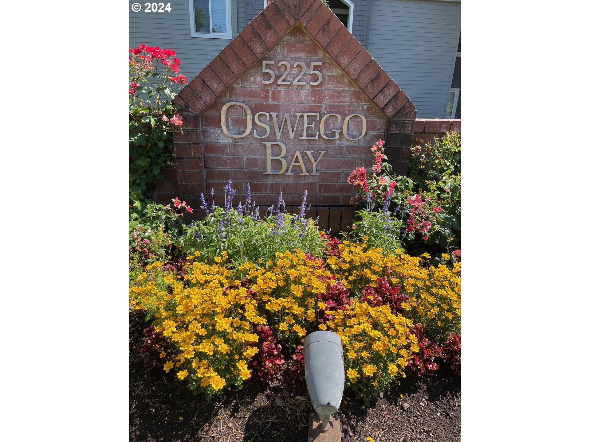 5225 Jean Road, Unit 312 Lake Oswego, OR 97035 - Photo 21 of 21 a sign that is sitting in front of a door
