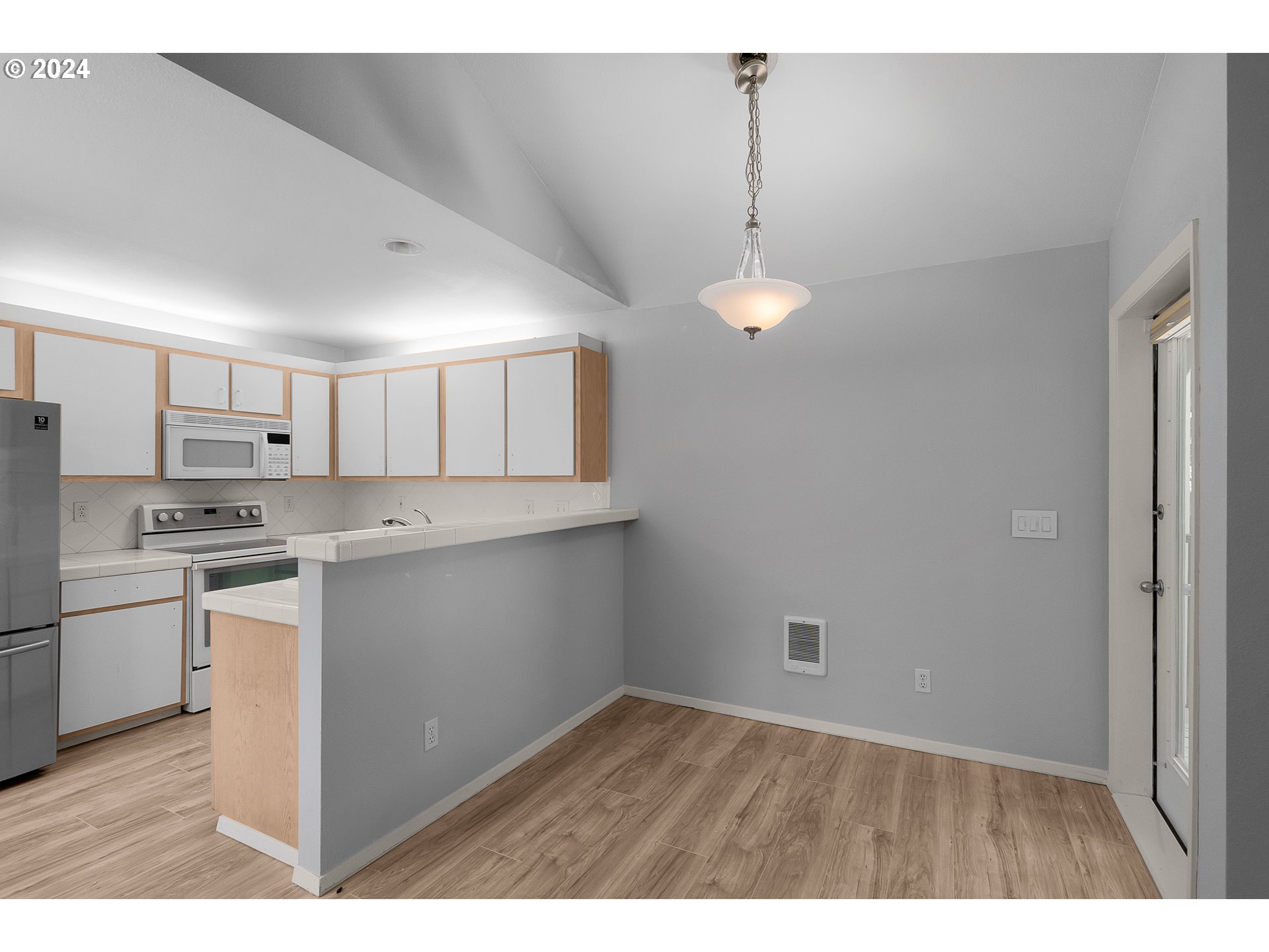 5225 Jean Road, Unit 312 Lake Oswego, OR 97035 - Photo 6 of 21 a view of a kitchen with a sink