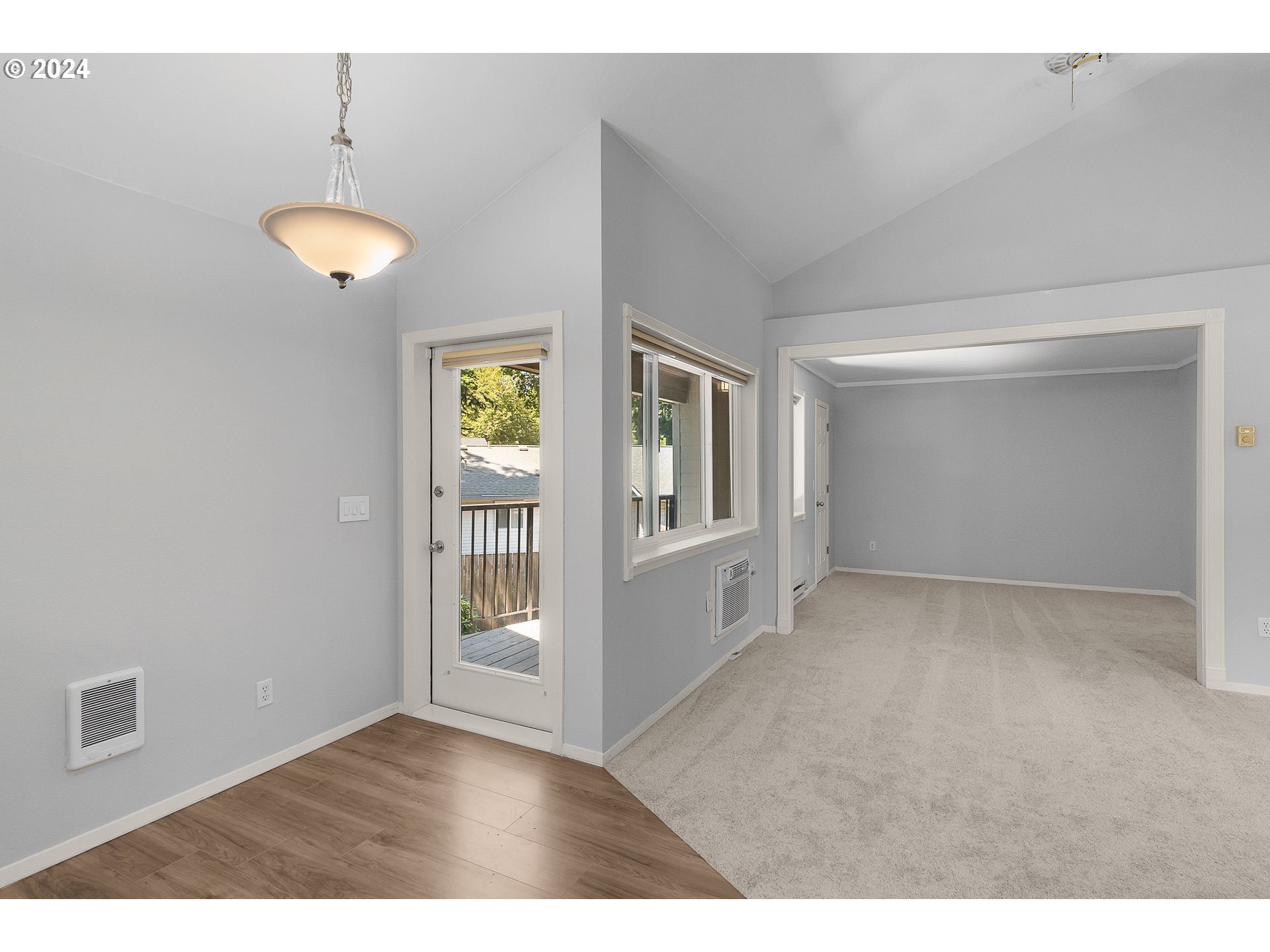 5225 Jean Road, Unit 312 Lake Oswego, OR 97035 - Photo 7 of 21 a view of an empty room with a window