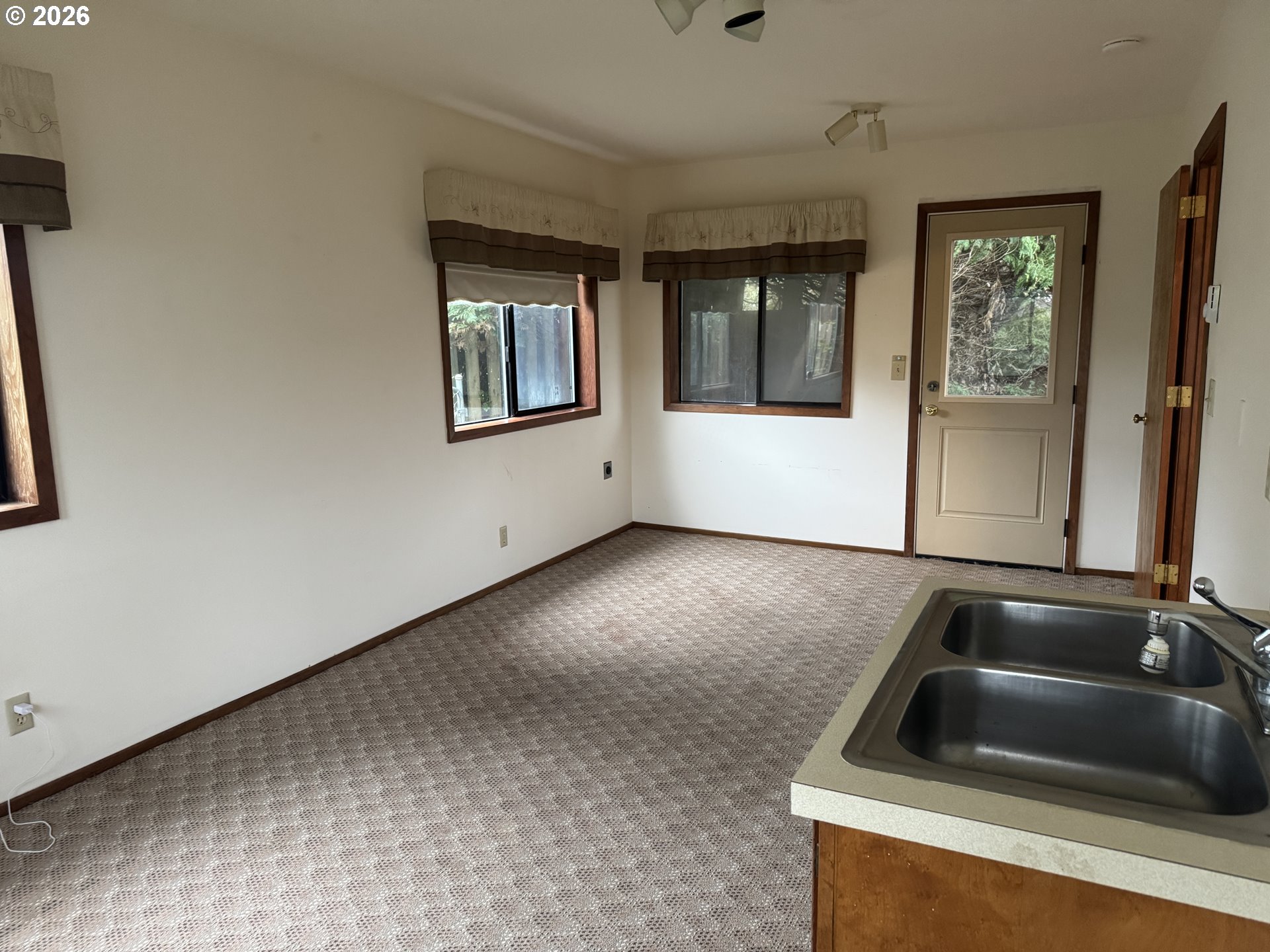 870 12th Street Southwest Bandon, OR 97411 - Photo 18 of 25 a view of an entryway with kitchen
