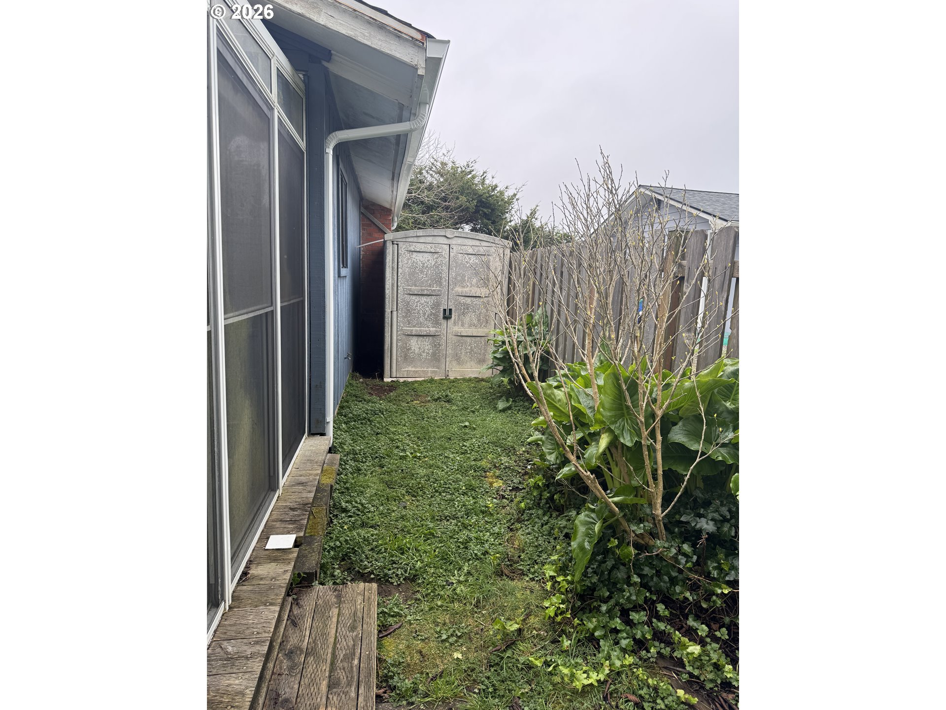 870 12th Street Southwest Bandon, OR 97411 - Photo 21 of 25 a backyard of a house