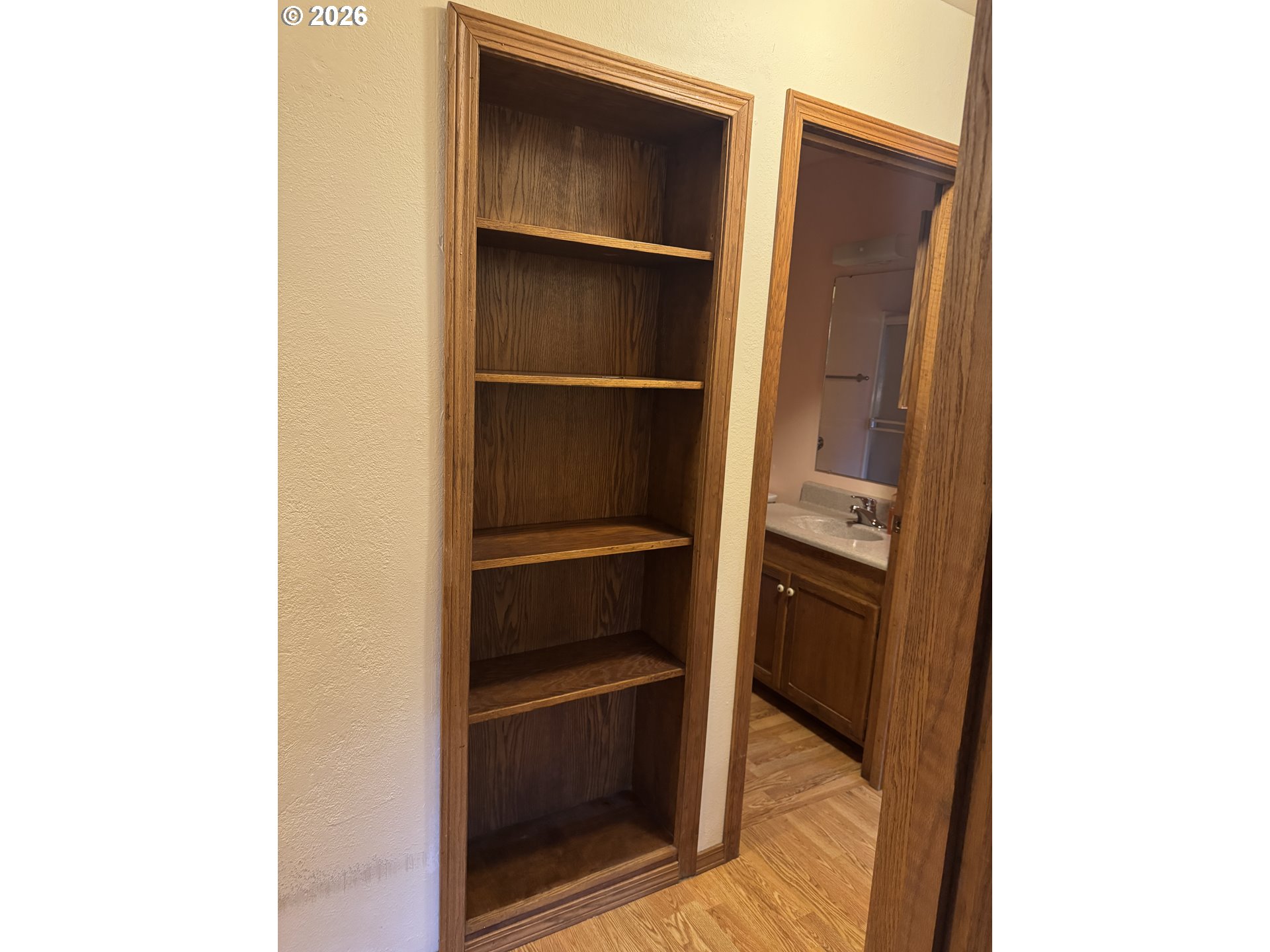 870 12th Street Southwest Bandon, OR 97411 - Photo 10 of 25 a view of walk in closet with empty racks
