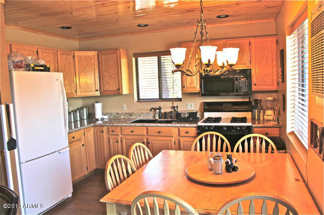 1995 Broken Arrow Road Overgaard, AZ 85933 - Photo 6 of 34 Kitchen1