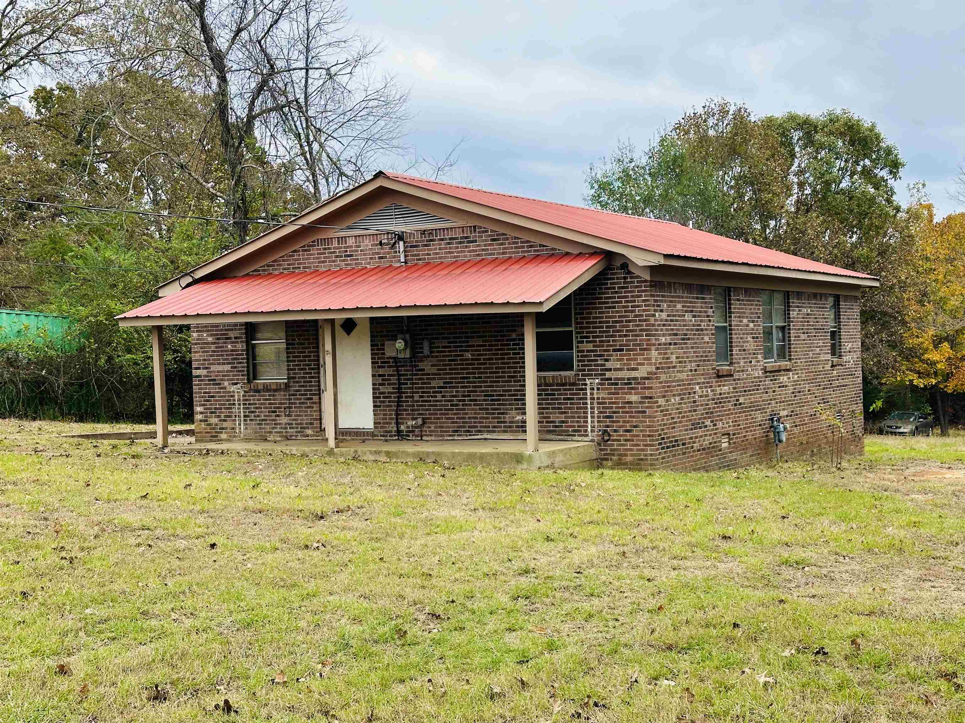 505 Patterson Lane Finger, TN 38334 - Photo 17 of 23 a view of a house with pool and a yard