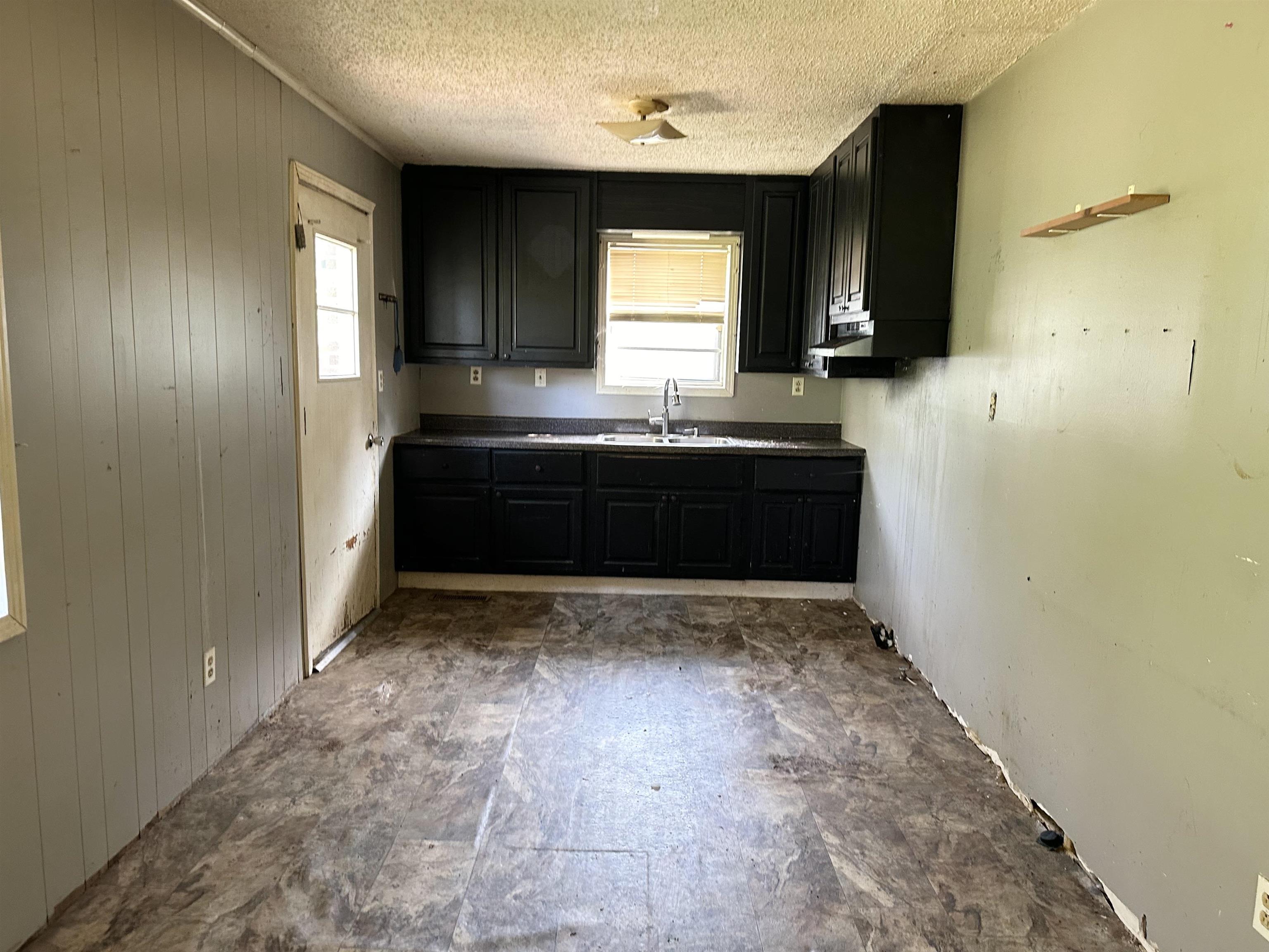 505 Patterson Lane Finger, TN 38334 - Photo 3 of 23 a bathroom with a sink and a large mirror
