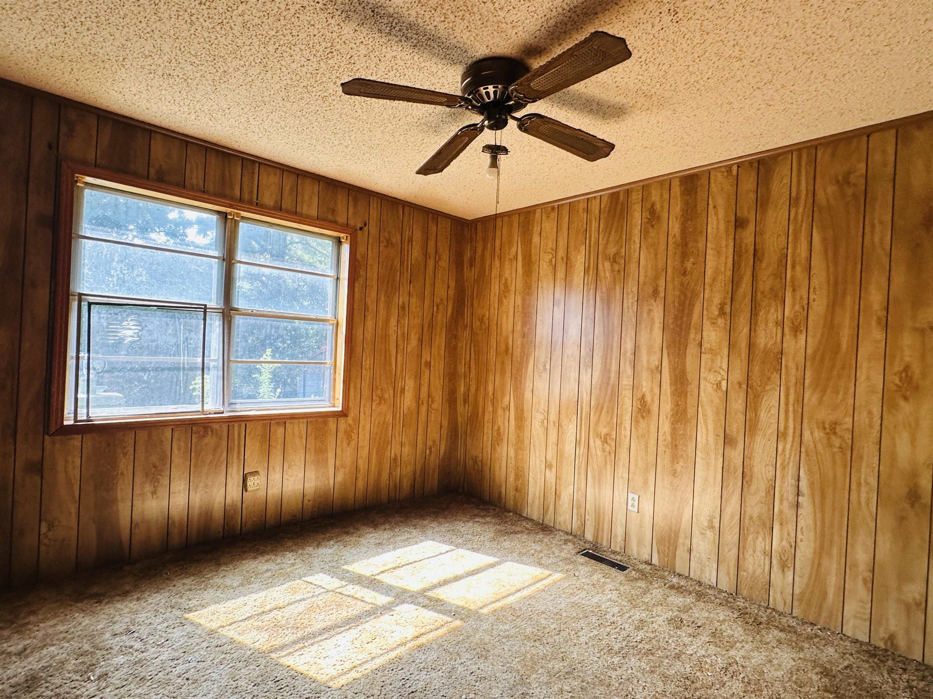 505 Patterson Lane Finger, TN 38334 - Photo 4 of 23 a view of an empty room with a window