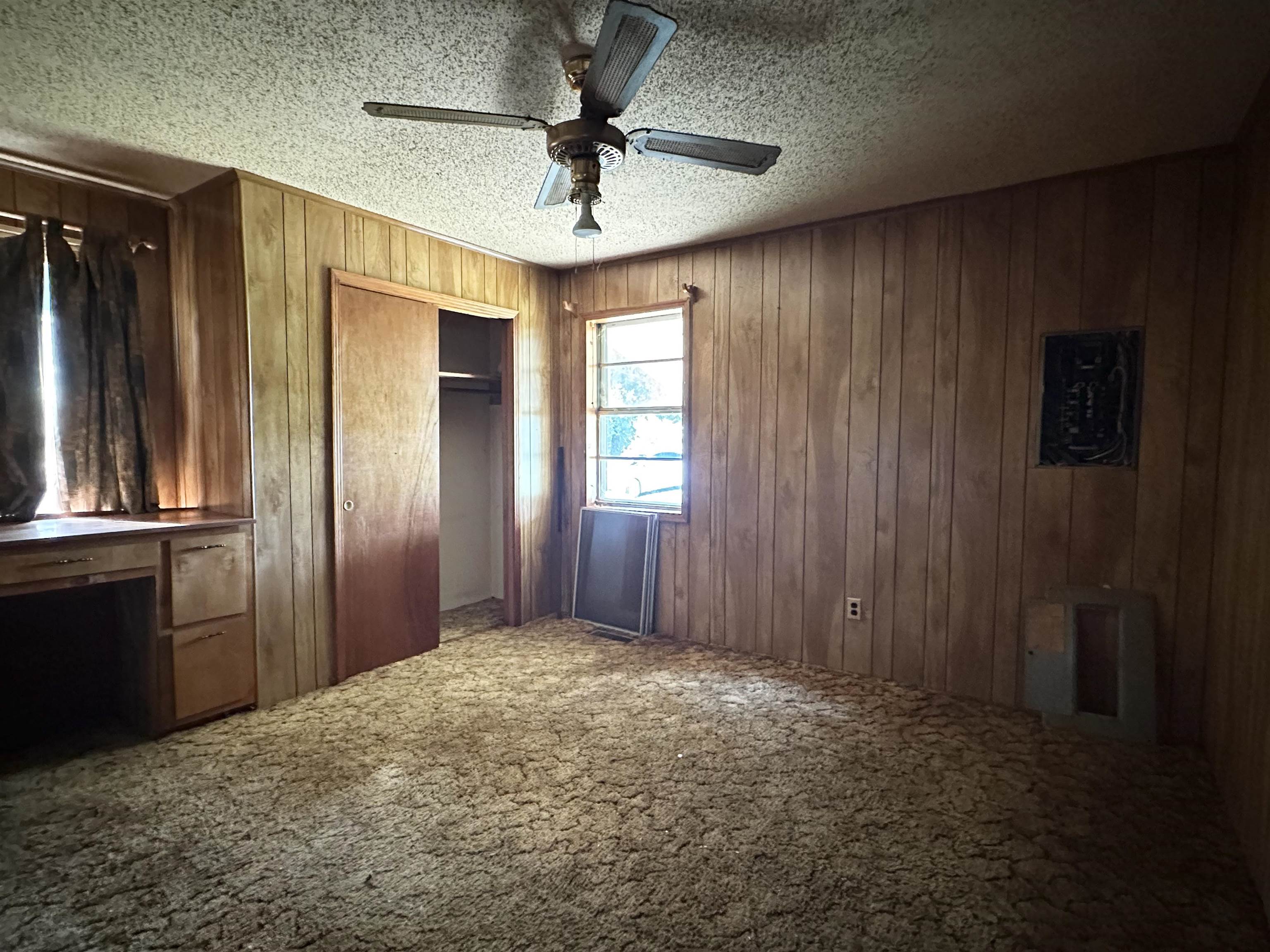 505 Patterson Lane Finger, TN 38334 - Photo 5 of 23 an empty room with windows and closet