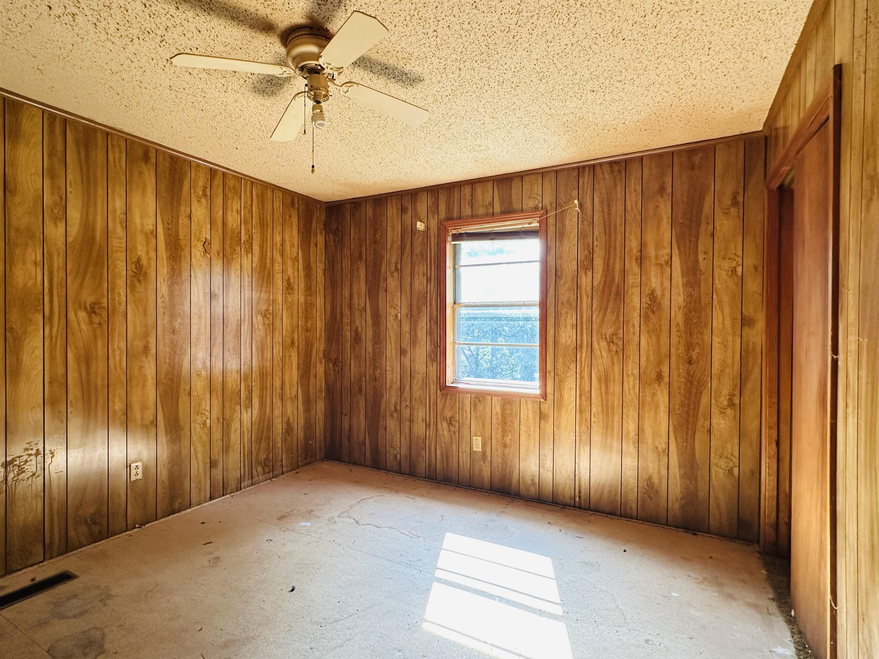 505 Patterson Lane Finger, TN 38334 - Photo 6 of 23 a view of a livingroom with a ceiling fan window and a ceiling fan
