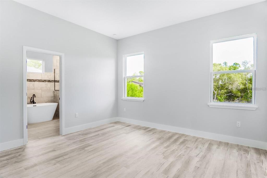 4540 Southwest 170th Street Road Ocala, FL 34473 - Photo 27 of 34 a view of an empty room and window