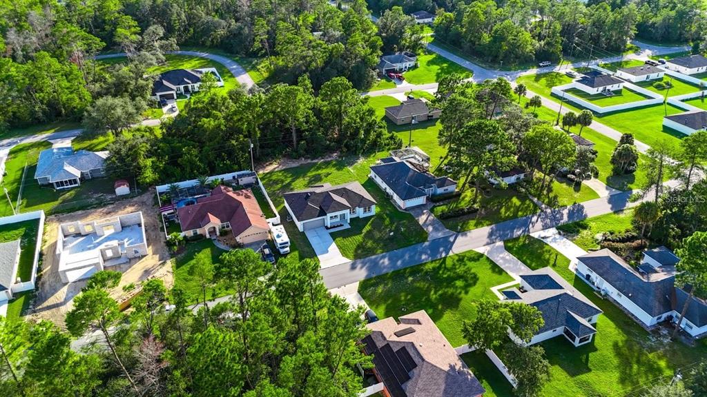 4540 Southwest 170th Street Road Ocala, FL 34473 - Photo 5 of 34 an aerial view of residential house with outdoor space and swimming pool