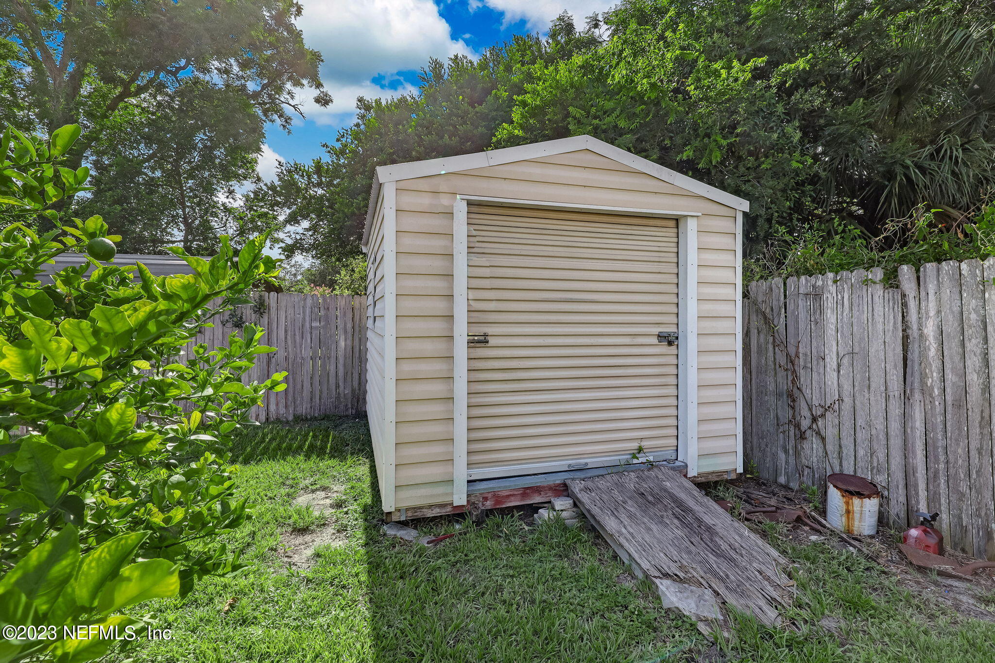 4511 Cambridge Road Jacksonville, FL 32210 - Photo 29 of 30 a front view of a house with garden