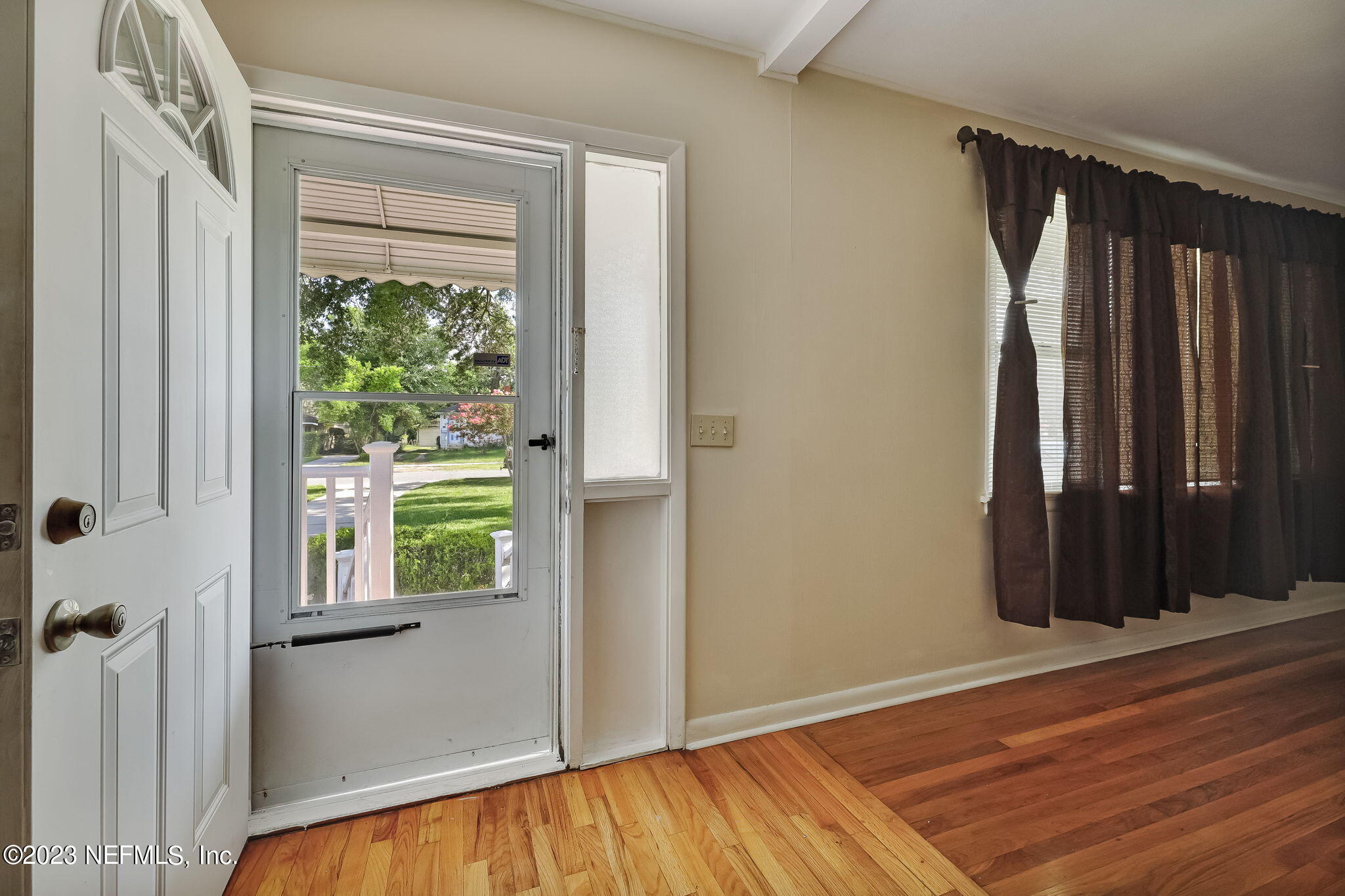 4511 Cambridge Road Jacksonville, FL 32210 - Photo 8 of 30 a view of front door with wooden floor