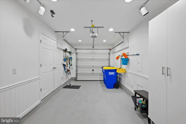 a view of storage and utility room with closet