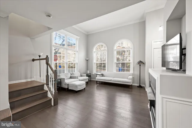 a view of living room with furniture and a large window