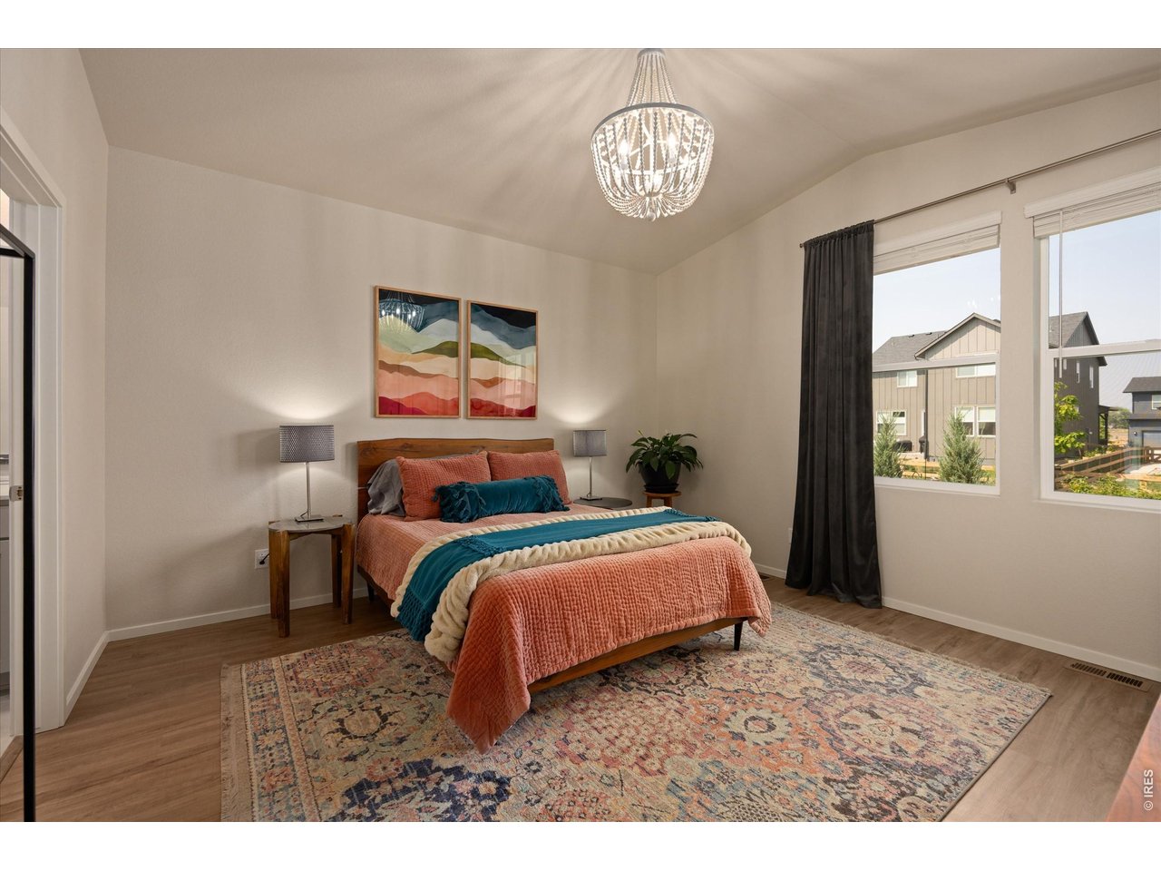 5251 Ribault Street Timnath, CO 80547 - Photo 20 of 47 Primary bedroom with vaulted ceiling