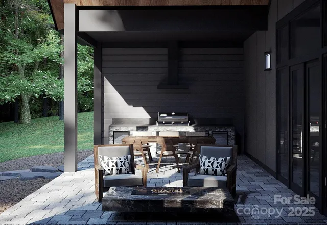 a view of a patio with table and chairs and garden