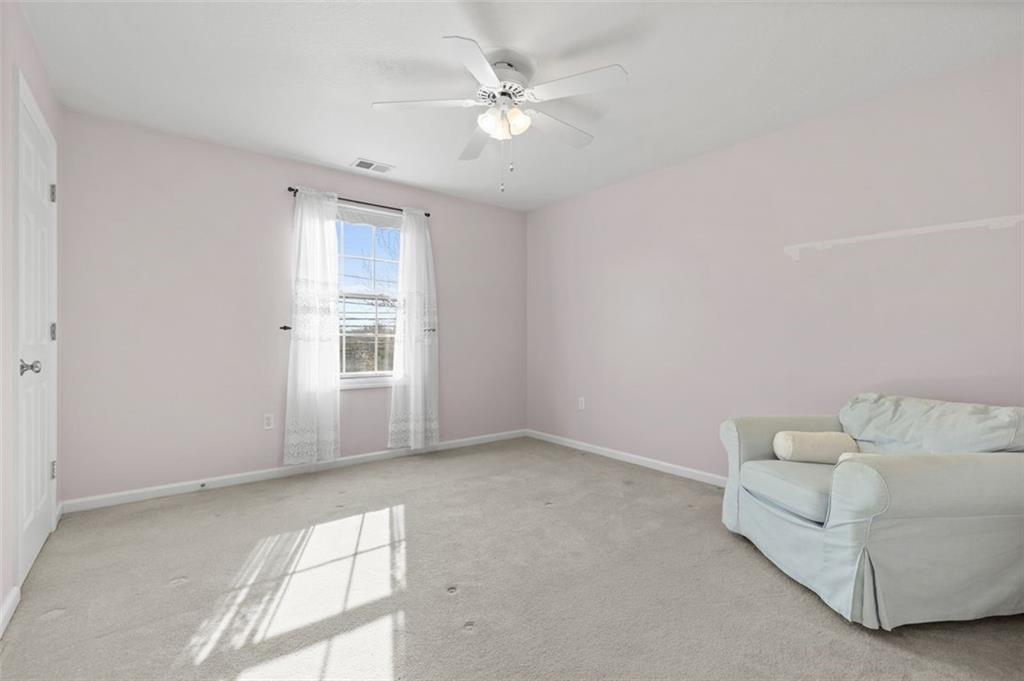 1 Coraopolis Road Coraopolis, PA 15108 - Photo 12 of 24 an empty room with windows and ceiling fan