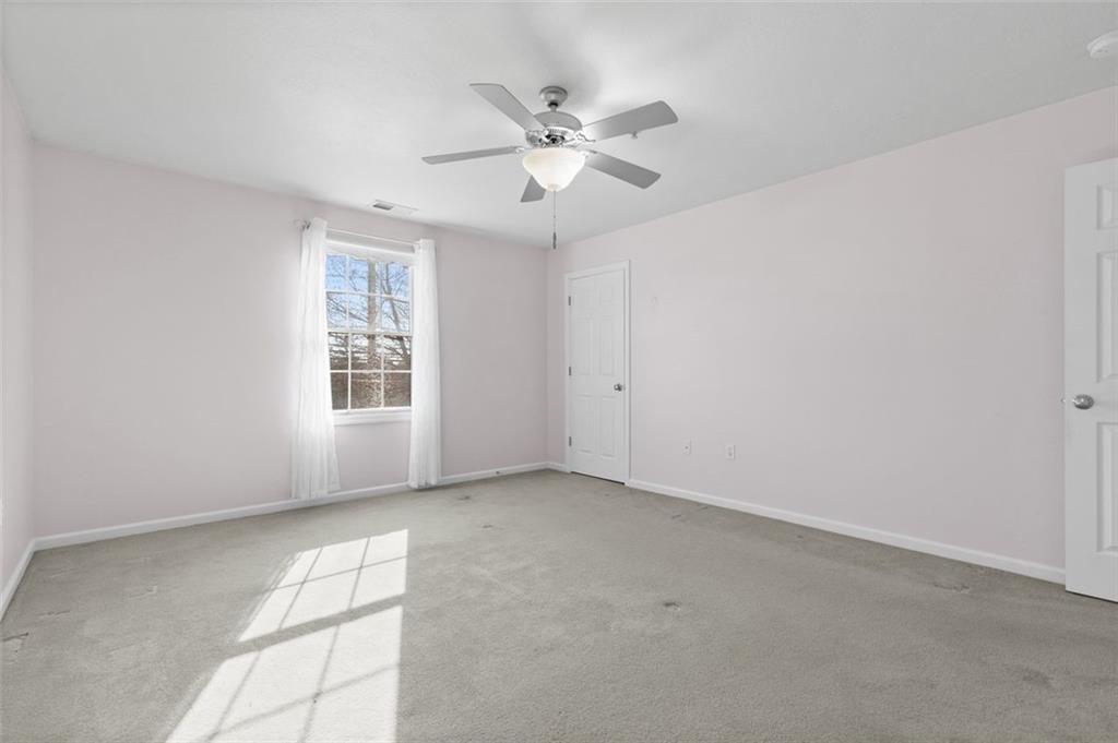 1 Coraopolis Road Coraopolis, PA 15108 - Photo 16 of 24 an empty room with windows and fan
